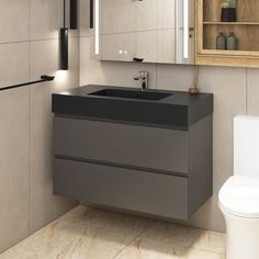 a bathroom with a toilet, sink and mirror in it's corner area next to a cabinet