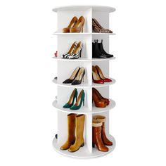 a white shelf filled with lots of different types of high heeled shoes on top of each other