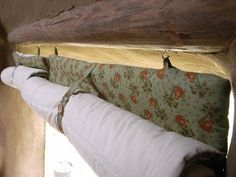 the inside of an oven with curtains hanging from it's sides and text that reads how to make your own energy - saving thermal curtains