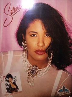 an album cover with a woman's face wearing pearls and necklaces on it