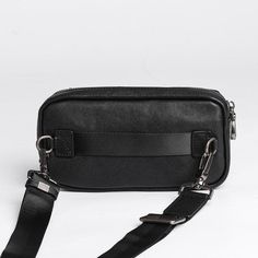 Specifications: Material: Top layer cow hide vegetable tanned leather Inner lining: Thickened polyester cotton Color: Black Size: 20.5cm wide, 10.5cm high, 3.5cm thick Shoulder strap: The length is about 154cm and can be adjusted Internal structure: Main bag, 3-clip, inner patch bag, outer magnetic buckle bag Note * the size measured by hand will have 1-3cm error, please take the real object as the standard Package list: Messenger Bag * 1 Versatile Leather Chest Bag With Removable Pouch, Business Black Phone Bag, Black Chest Bag With Detachable Strap For Travel, Modern Black Phone Bag With Adjustable Strap, Black Travel Chest Bag With Detachable Strap, Leather Belt Bag For Mobile Phone On-the-go, Versatile Black Business Phone Bag, Black Satchel Chest Bag With Detachable Strap, Black Crossbody Chest Bag With Detachable Strap