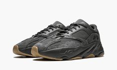 The adidas Yeezy Boost 700 “Utility Black” is a clean and stealthy edition of the famous chunky silhouette by Kanye West and the Three Stripes.  This summer 2019 release features an all-black upper built in mesh, shaggy suede, and soft leather across the entire upper, inner lining, and thick midsole.  Reflective black details are also added to the upper and oval shapes of the midsole.  Contrasting the blacked-out upper is a gum rubber outsole below for an excellent touch to the design.  The adid Yeezy Boost 700 V2, 70s Converse, Adidas Yeezy 700, Nike X Travis Scott, Sneakers Box, Kobe Shoes, Yeezy 700, Nike Dunk High, Nike Shox