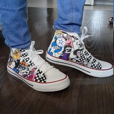 "⭐ FREE SHIPPING ⭐ What's your favorite 90s cartoon character's style? Now you can rock their look with your very own pair of 90s Cartoon Network Custom Sneakers! These stylish hippie sneakers are inspired by the characters from your favorite cartoons and are available in unisex sizes. Each shoe is hand-painted by a unique artisan, so you know you're getting a one-of-a-kind product. Benefits: ⭐ A must-have for any cartoon fan ⭐ Available in unisex sizes ⭐ Hand-painted by a unique artisan What ar Casual Custom Sneakers With Anime Print, Casual Custom Sneakers With Character Print For Streetwear, Casual High-top Lace-up Sneakers With Anime Print, Casual Anime Print High-top Lace-up Sneakers, White High-top Sneakers With Cartoon Print, Casual Low-top Custom Sneakers With Anime Print, Casual High-top Sneakers With Anime Print, Casual Anime Print High-top Sneakers, Cartoon Print Sneakers For Streetwear