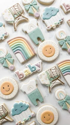 baby shower cookies are arranged on a table