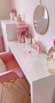 a white desk topped with pink chairs next to a mirror and shelf filled with cosmetics