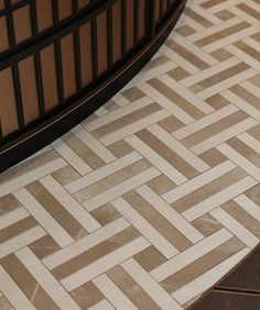 a close up of a tile floor with lines on the bottom and sides in different colors