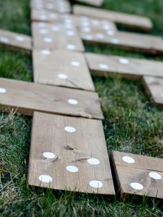 diy backyard domino game with white dots on it