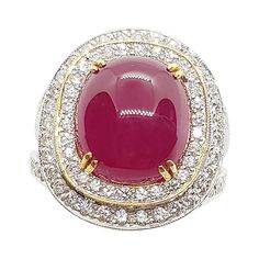 Cabochon Ruby 7.76 carats with Diamond 2.17 carats Ring set in 18 Karat White Gold Settings Width: 1.5 cm Length: 2.0 cm Ring Size: 53 Total Weight: 13.78 grams "We first opened doors in 1980 when it was then situated in the vicinity of the Victory Monument; a small and modest storefront with a couple of counters. From its humble beginnings to where it stands today, our company has proven its abilities as a jeweler. Since the beginning, we have been supplying fine quality pieces to dealers, whol Luxury Oval Cabochon Gemstones, Luxury Diamond Cabochon Gemstones, Luxury Diamond Gemstones With Cabochon Cut, Luxury Oval Cabochon Diamond Gemstones, Luxury Oval Cabochon Ruby Ring, Luxury Ruby Ring With Cabochon Cut, Luxury Oval Ruby Ring, Luxury Cabochon Diamond Ring For Formal Occasions, Luxury Ruby Cabochon Diamond Ring