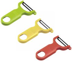 three different colors of scissors are shown in this image