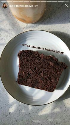 a piece of chocolate banana bread on a plate with the words salted chocolate banana bread