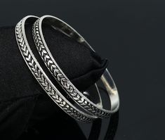 "925 sterling silver handcrafted design, stylish fancy vintage antique design tribal jewelry, excellent gift tribal belly dance jewelry. Metal-925 sterling silver. Item type-Bangles/Bracelet Weight- 30.750 grams. Width of bangles-6.0 mm approx. Size-2-8 or 2.5\" or 6.4 centimeters. Quantity-2 pieces.(1 pair) Stamped-925. Finish-Oxidized. Makes excellent gifting for birthday, wedding , anniversary, Christmas day. valentines day, mother's day." Silver Bangles Bracelets, Silver Kangan Design, Bohemian Silver Bangle With Oxidized Finish, Bohemian Bangle Jewelry With Oxidized Finish, Bohemian Bangle With Oxidized Finish, Hand Set Silver Bohemian Bangle, Bohemian Silver Bangle Hand Set, Silver Bohemian Bangle With Hand Set Details, Bohemian Oxidized Bangle Jewelry