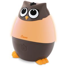 an owl shaped speaker with eyes on it's head and legs, sitting in front of a white background