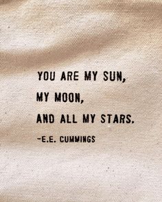 a quote written in black on top of a white cloth with the words you are my sun, my moon, and all my stars