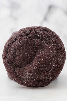 a close up of a chocolate cookie on a table