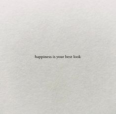 the words happiness is your best look written on white paper