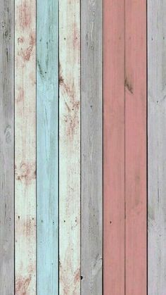 wood planks painted pink, blue and green with the same color as each other