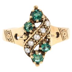 Beautifully crafted in 9 carat gold, The Sarai Ring is a vintage delight. With her band lightly patterned and shining emeralds separated by a gently winding river of satiny seed pearls, she is a sweet inclusion in your jewellery collection. The Sarai Ring Gem Details The bright mid to light green emeralds measure approximately 2.5 to 3.0 millimetres. The white half seed pearls measure approximately 2 millimetres. Ring Size M 1/2 (Australia and UK sizing) or 6 1/2 (US and Canada) The Parker Ring Vintage Multi-stone Emerald Ring In 14k Gold, Vintage Multi-stone Emerald Jewelry, Vintage Multi-stone Green Emerald Ring, Vintage Green Emerald Ring With Multi-stone, Victorian 14k Stamped Green Emerald Ring, Vintage 14k Emerald Ring For May Birthstone, Winding River, Seed Pearl Ring, Seed Pearl