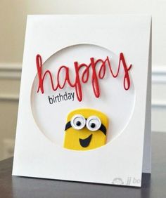 a happy birthday card with an image of a minion holding the word happy on it