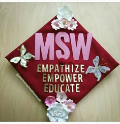 a red cap with the words msw empathize empowerer education written on it