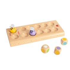 a wooden toy with four different shapes and colors on it's sides, including two eggs