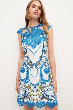 Proving That Lace Needn'T Look Twee, This Ultra-Modern Mini Dress Shows Off Swathes Of The Delicate Fabric Rendered In Bright, Color-Pop Blue. Detailed With Edgy Cut-Outs At Each Shoulder Along With An Open Back, Cap Sleeves And Flirty, Above-Knee Hem, This Unique Piece Is Sure To Become A Prized Part Of Your Dressing-Up Repertoire. Knit Skater Dress, Kimono Maxi Dress, Maxi Kimono, Lace Weave, Knit Mini Dress, Woven Dress, Mini Shift Dress, Karen Millen, Embellished Dress