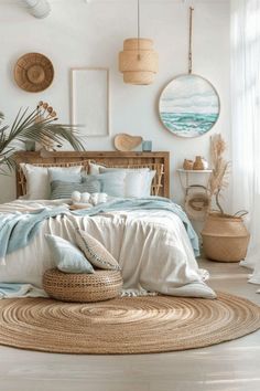 a bedroom with white walls and blue bedding