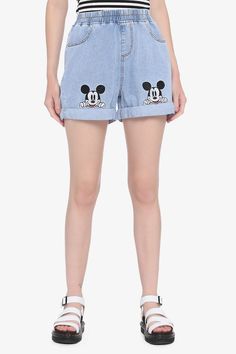 Slip into some comfy shorts for a fun day at the park. These high-waisted denim blue shorts have an elasticated waistband, hip pockets and back pockets. The leg openings are cuffed with embroidered Mickey Mouse patches peeking on the front of each leg. Disney Fits, Disney Clothing, Disney Adult, Cute Disney Outfits, Disney Shorts, Day At The Park, Disney Patches, Disney Clothes, Culture Clothing