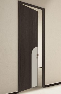 an open door is shown in front of a white wall with black and grey trim