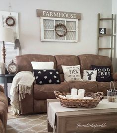 a living room filled with furniture and pillows