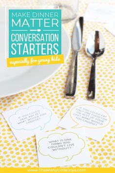 three conversation bubbles on top of a yellow and white table cloth with forks, spoons and silverware