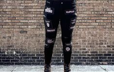 Womens Punk Patch Pants - Crust Punk Pants with Patches, Zippers, & Studs - Punk Band Patch Pants - Punk Rock Patched Pants - Goth Alt Clothing Women's size Medium pants with 9 studs, 14 patches, and 2 extra zippers (back of each leg). All patches are handmade by me using white vinyl and black canvas.  All patches are hand-sewn onto the pants using double layered thread. All extra zippers are hand-sewn onto the pants by me using double layered thread. All decorative studs are installed by me. Patch edges have NOT been folded under before sewing them onto the pants, so they WILL become frayed.  The more they are worn/washed, the more they will fray.  They just get better with age! ;) Grunge Pants With Belt Loops For Concerts, Rocker Pants With Belt Loops For Concerts, Rocker Style Pants With Belt Loops For Concerts, Emo Streetwear Pants With Belt Loops, Gothic Black Bottoms For Biker Events, Black Gothic Bottoms For Biker Events, Gothic Fitted Pants For Streetwear, Fitted Rock Bottoms For Alternative Fashion, Rock Style Fitted Bottoms For Streetwear