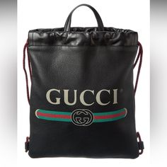 Gucci Drawstring Leather Backpack About The Brand: Eclectic And Coveted. Italian Luxury Redefined. Made In Italy Drawstring Leather Backpack In Black Leather And Light Fine Gold Hardware With Graphic Logo Print Interior Design Details: Suede Lining, Zippered Pouch Measures 11.5in Wide X 14in High X 3in Deep Top Handles Drop 3in Shoulder Straps Drop 17in Drawstring Closure Backpack Free, Bags Gucci, Black Leather Tote Bag, Women Leather Backpack, Gucci Gucci, Zippered Pouch, Graphic Logo, Tote Bag Leather, Italian Luxury