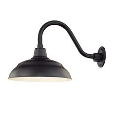 a black wall light with an arm and white shade on the top, against a white background