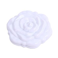 a white rose shaped object on a white background