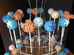 an assortment of cake pops with clown fish on them