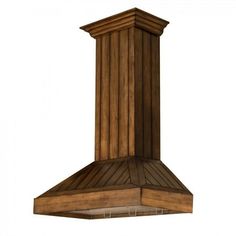 a large wooden stove hood mounted on a wall