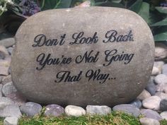 a rock that says don't look back you're not going that way