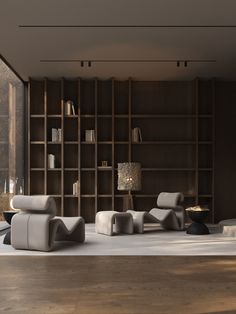 a living room filled with lots of furniture next to a tall book shelf full of books