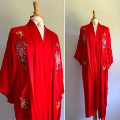 This stunning kimono features an intense shade of cherry red with traditional floral embroidery in hues of pink, green, yellow and blue. Unlined. Fits up to large sizes.  Label: none  Era: early 2000s  Pictured on a US size 6/8 dress form  Two hip pockets  Clean and ready to wear  Minor scuff on lapel (see photo) Spring Floral Embroidered Kimono With Kimono Sleeves, Spring Floral Embroidery Kimono With Kimono Sleeves, Long Floral Embroidered Kimono For Spring, Silk Kimono With Floral Embroidery, Long Floral Embroidery Kimono For Festivals, Long Floral Embroidered Kimono For Festival, Spring Wedding Kimono With Floral Embroidery, Spring Wedding Embroidered Kimono, Spring Silk Kimono With Embroidery