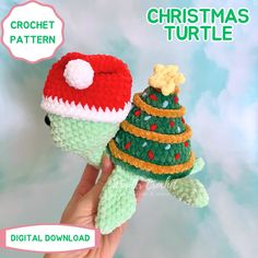 a crochet christmas turtle with a hat on it's head is shown