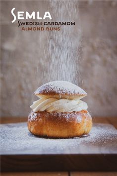 a doughnut is sprinkled with powdered sugar