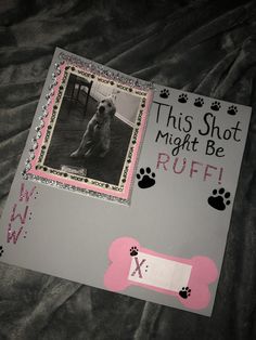 a card with a dog's paw prints and the words, this shot might be ruff