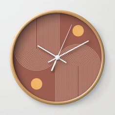 a clock with two circles on the front and one circle on the back that is brown