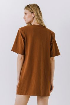 This Shoulder Pad T-Shirt Dress is a wardrobe must-have! Featuring a stylish round neckline, short sleeves, and a boxy silhouette, it's the perfect addition to any outfit. Our unique shoulder pad insert adds structure and a touch of sass, making this dress a standout. With its comfortable fit and comfortability, you'll look amazing no matter what the occasion. Show off your fashion-forward style with this shoulder-pad t-shirt dress! Shoulder pad inserted Round neckline Short sleeves Boxy silhoue Cotton T-shirt Dress For Everyday, Brown Oversized Short Sleeve Dress, Trendy Black Short Sleeve T-shirt Dress, Oversized Short Sleeve T-shirt Dress, Solid Color Cotton T-shirt Dress With Crew Neck, Cotton Crew Neck T-shirt Dress, Relaxed Cotton T-shirt Dress, Cheap Relaxed Fit Short Sleeve T-shirt Dress, Relaxed Fit Cotton T-shirt Dress