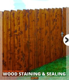 a wooden fence with the words wood staining and sealing on it's side