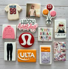 decorated cookies are arranged in the shape of pictures and words for birthdays or other special occasions