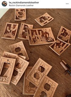 some wood cut outs sitting on top of a wooden table