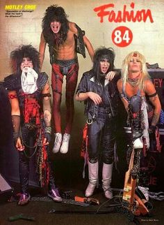 the cover of fashion magazine, featuring four men dressed in punk clothing and makeup on their faces