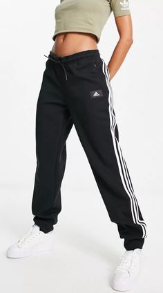 adidas L106801 Womens Black Future Icons 3-Stripes Regular Pants Size M Details & Care Lounging done right Elasticated drawstring waist Side zip-pockets adidas logo details Regular, tapered fit 100% Polyester. Adidas Sneakers Outfit, Black Future, Striped Sweatpants, Adidas Joggers, Streetwear Mode, Blue Joggers, Joggers Outfit, Adidas Outfit, Performance Leggings