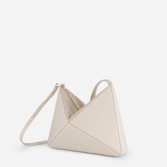 Our architectural, origami inspired shoulder bag, now has a new dimension. It can be converted into a wrist bag just with a quick move. The shoulder strap can easily be removed, so you can slung it from your wrist or use as a clutch. It has plenty of room inside for your essentials including a large phone, small wallet, and 300 ml water bottle. Made from smooth leather and has a suede top with two-way zip fastening. Interior features two slip pockets. Crafted from Italian calf leather. Canvas li Suede Tops, Secret Sale, New Launch, Small Wallet, Smooth Leather, Calf Leather, Shoulder Strap, Product Launch, Wallet